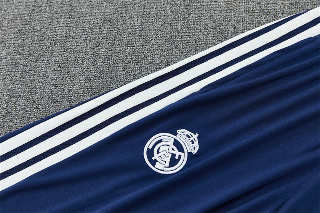 Tuta Real Madrid Blu Half-Zip 26/27 Uomo | Tuta da Calcio - CalcioVivo