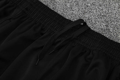 Kit Tank Top + Shorts Manchester United Training White 25/26