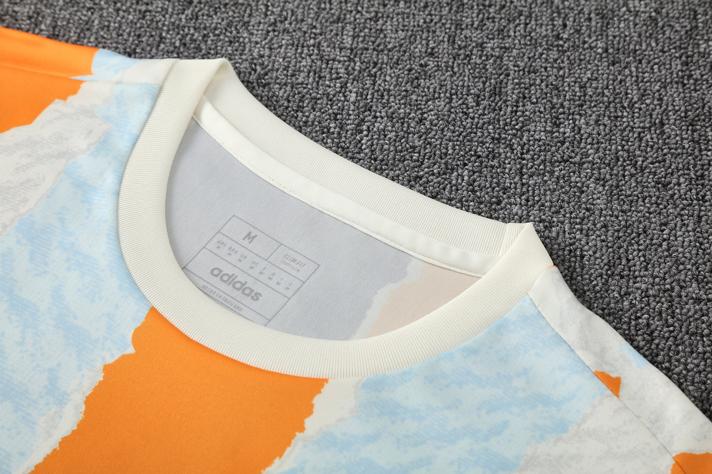 Kit Shirt + Shorts Real Madrid White/Black/Orange Training 25/26