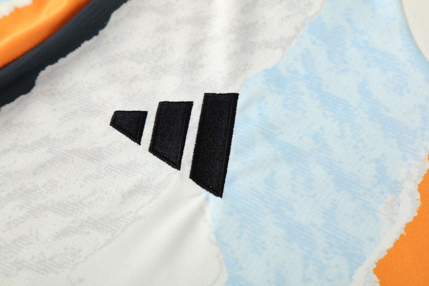 Kit Shirt + Shorts Real Madrid White/Black/Orange Training 25/26