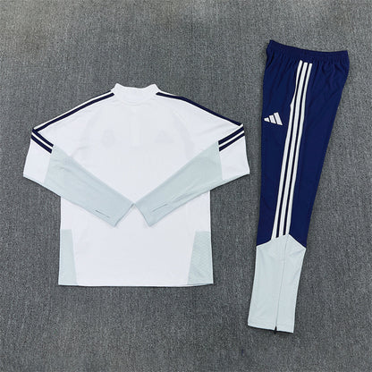 Tuta Real Madrid Bianco/Blu Half-Zip 26/27 Uomo | Tuta da Calcio - CalcioVivo