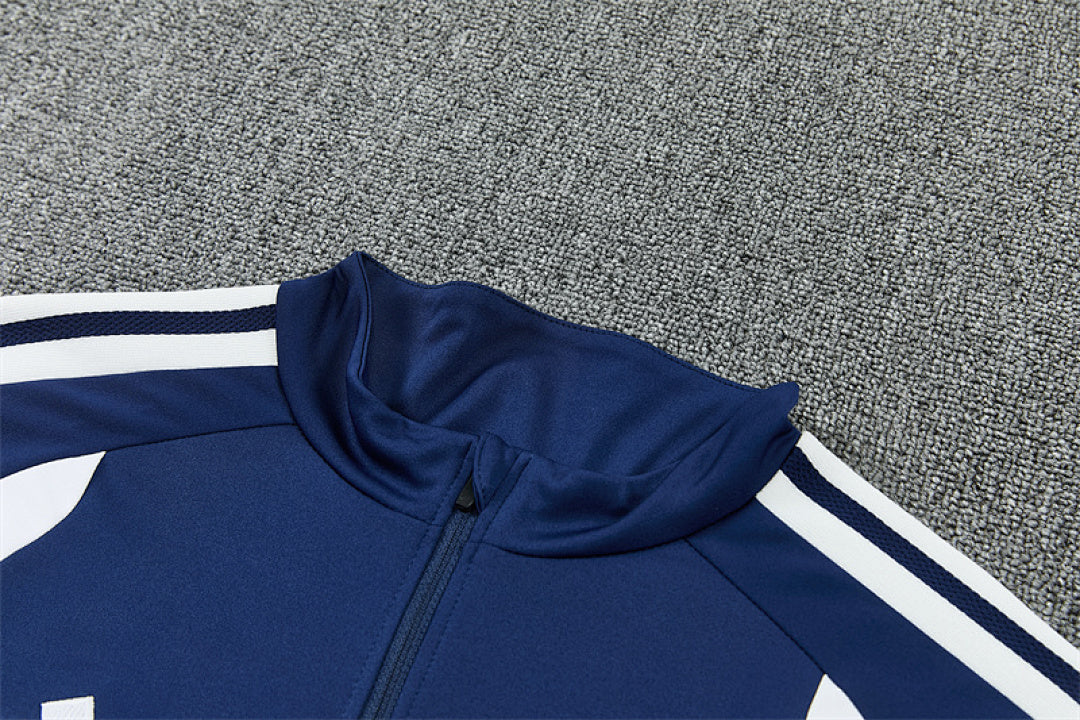 Tuta Real Madrid Blu Half-Zip 26/27 Uomo | Tuta da Calcio - CalcioVivo