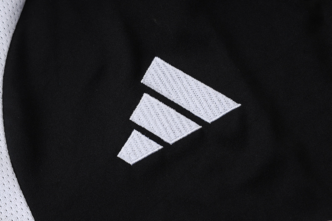 Tuta Real Madrid Nero/Bianco Half-Zip 26/27 Uomo | Tuta da Calcio - CalcioVivo
