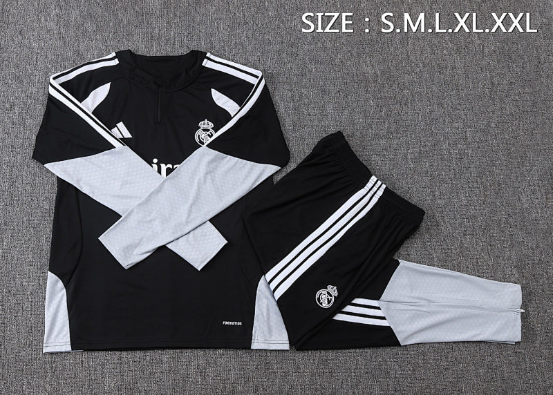 Tuta Real Madrid Nero/Bianco Half-Zip 26/27 Uomo | Tuta da Calcio - CalcioVivo