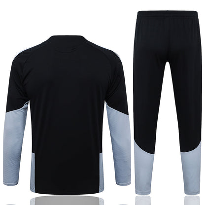 Tuta Real Madrid Nero/Bianco Half-Zip 26/27 Uomo | Tuta da Calcio - CalcioVivo