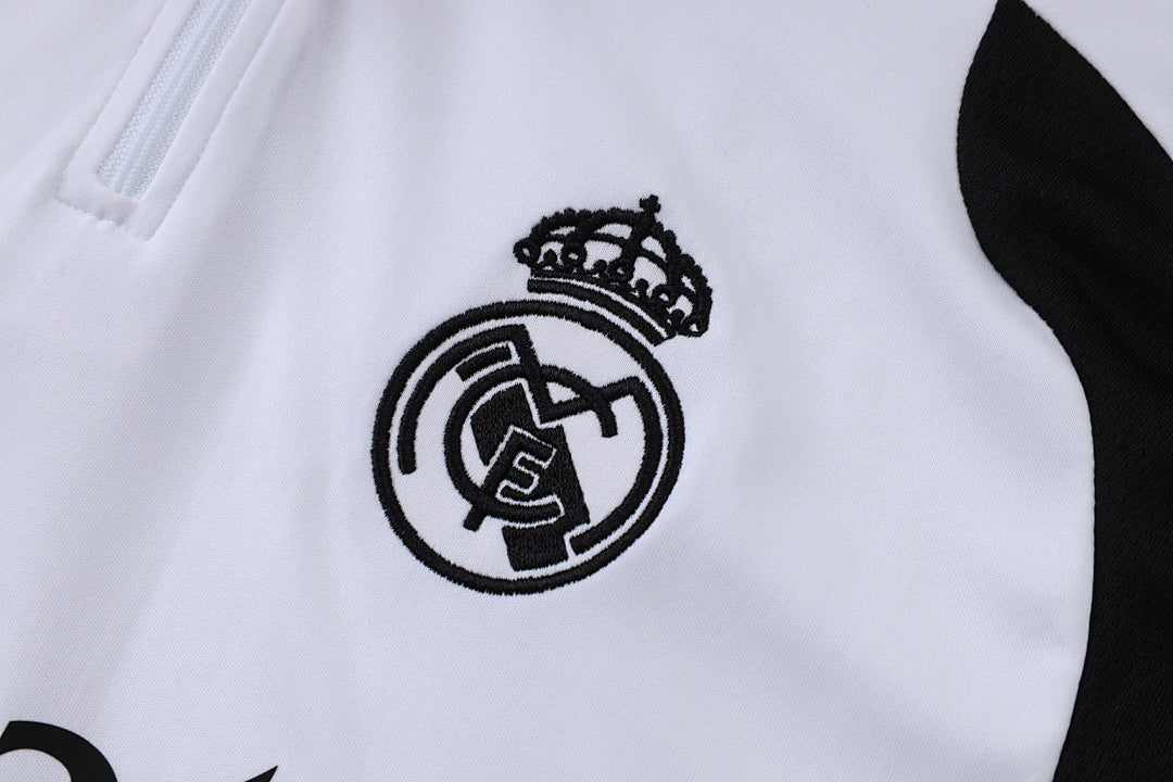 Tuta Real Madrid Bianco/Nero Half-Zip 26/27 Uomo | Tuta da Calcio - CalcioVivo
