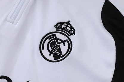 Tuta Real Madrid Bianco/Nero Half-Zip 26/27 Uomo | Tuta da Calcio - CalcioVivo