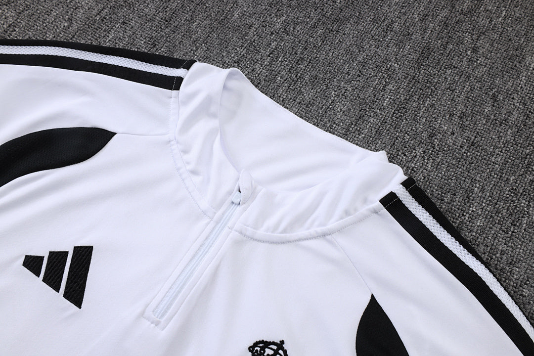 Tuta Real Madrid Bianco/Nero Half-Zip 26/27 Uomo | Tuta da Calcio - CalcioVivo