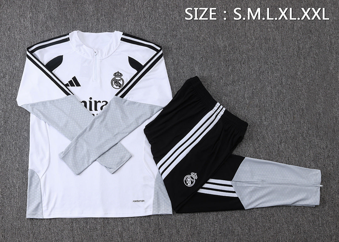 Tuta Real Madrid Bianco/Nero Half-Zip 26/27 Uomo | Tuta da Calcio - CalcioVivo