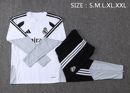 Tuta Real Madrid Bianco/Nero Half-Zip 26/27 Uomo | Tuta da Calcio - CalcioVivo
