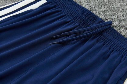 Tuta Real Madrid Blu Half-Zip 26/27 Uomo | Tuta da Calcio - CalcioVivo