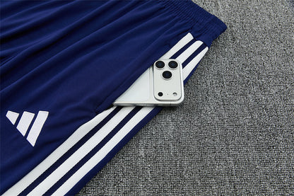 Tuta Real Madrid Bianco/Blu Half-Zip 26/27 Uomo | Tuta da Calcio - CalcioVivo