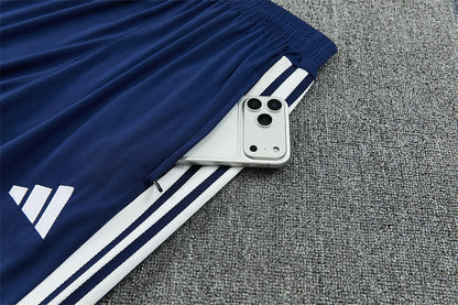 Tuta Real Madrid Blu Half-Zip 26/27 Uomo | Tuta da Calcio - CalcioVivo
