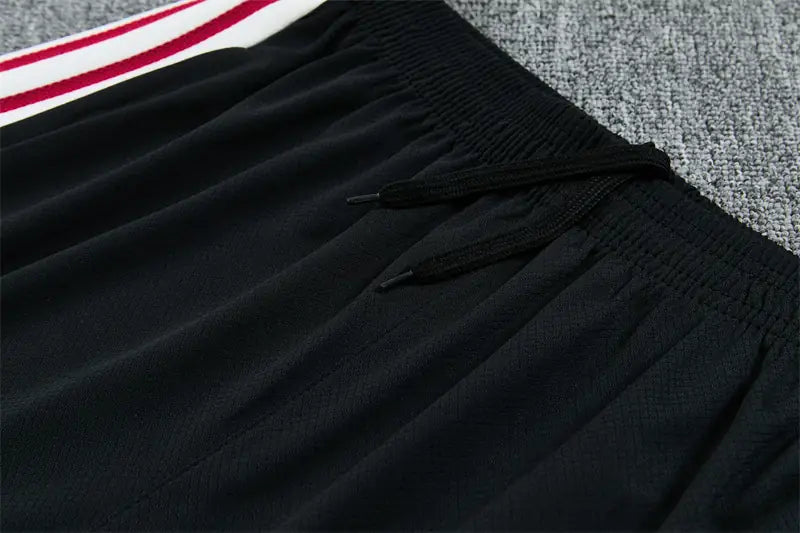 Completino Manica Corta Arsenal 26/27 Uomo Nero con inserti Fucsia | Kit Allenamento - CalcioVivo