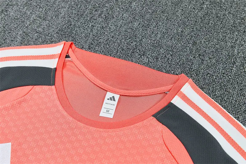 Completino Manica Corta Real Madrid 26/27 Uomo Arancione Corallo | Kit Allenamento - CalcioVivo