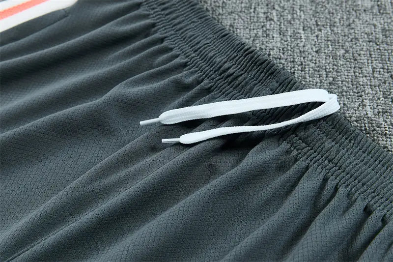 Completino Manica Corta Real Madrid 26/27 Uomo Arancione Corallo | Kit Allenamento - CalcioVivo