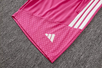 Completino Polo Real Madrid 26/27 Uomo Fucsia | Kit Allenamento - CalcioVivo