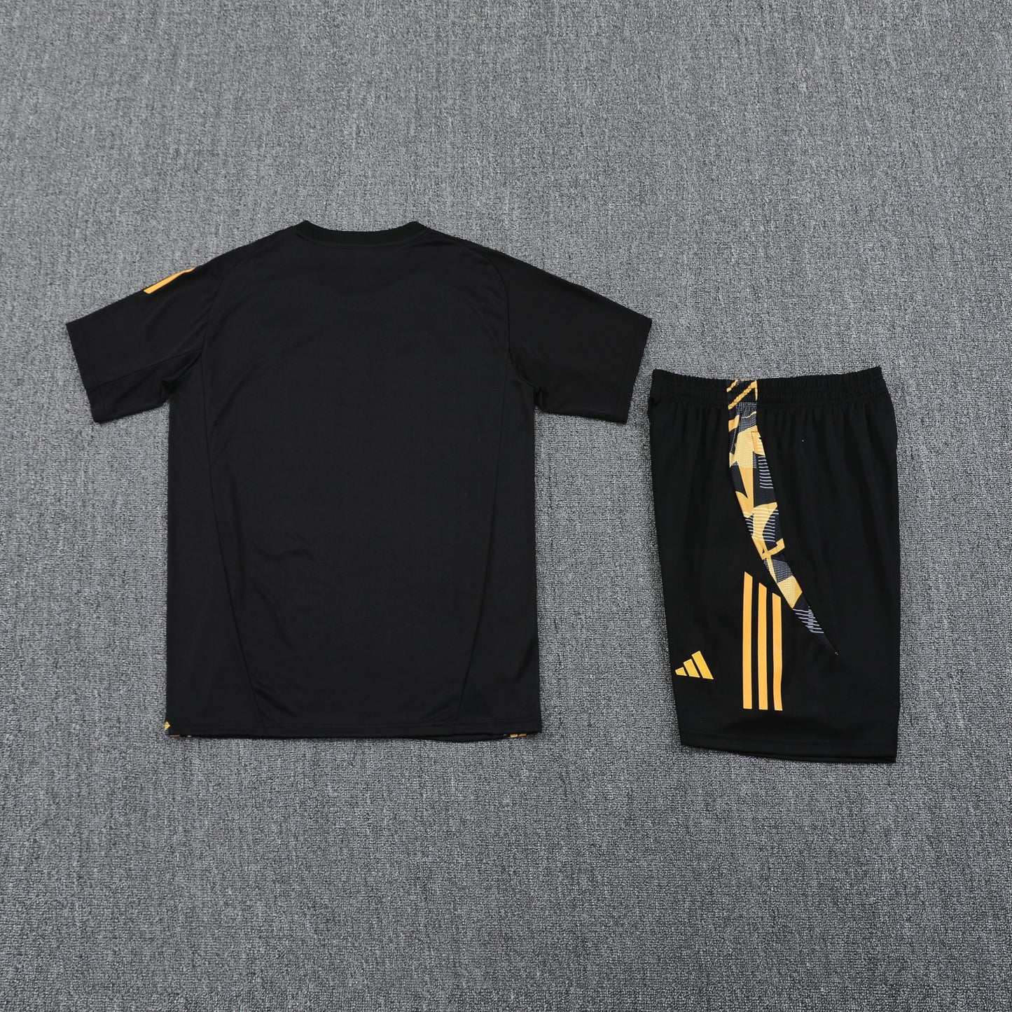 Kit Tank Top + Shorts Real Madrid Black/Orange Training 24/25