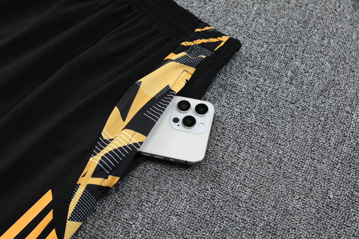 Kit Tank Top + Shorts Real Madrid Black/Orange Training 24/25