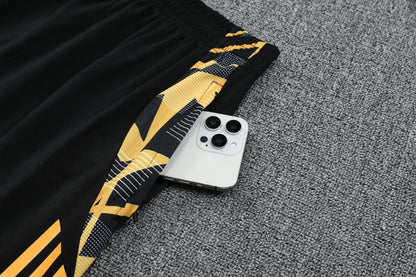 Kit Tank Top + Shorts Real Madrid Black/Orange Training 24/25