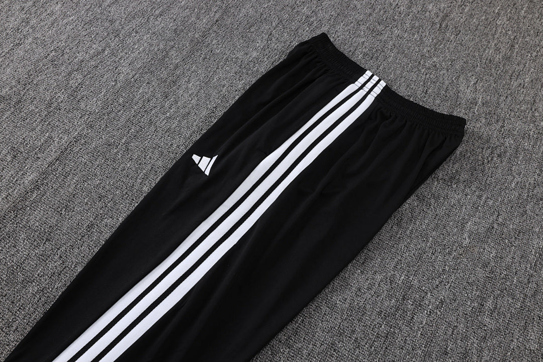 Tuta Real Madrid Nero/Bianco Half-Zip 26/27 Uomo | Tuta da Calcio - CalcioVivo
