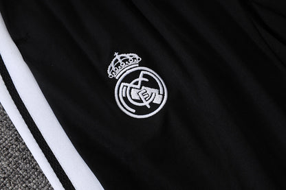 Tuta Real Madrid Bianco/Nero Half-Zip 26/27 Uomo | Tuta da Calcio - CalcioVivo