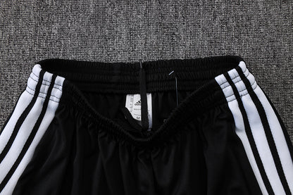 Tuta Real Madrid Nero/Bianco Half-Zip 26/27 Uomo | Tuta da Calcio - CalcioVivo