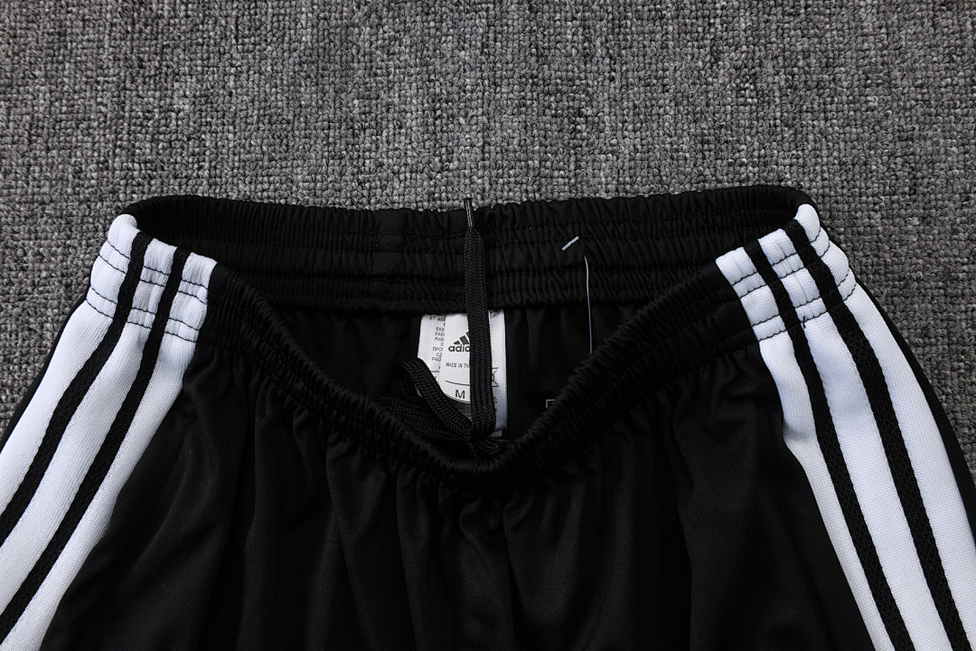Tuta Real Madrid Bianco/Nero Half-Zip 26/27 Uomo | Tuta da Calcio - CalcioVivo