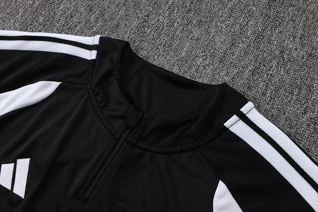Tuta Real Madrid Nero/Bianco Half-Zip 26/27 Uomo | Tuta da Calcio - CalcioVivo