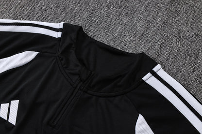 Tuta Real Madrid Nero/Bianco Half-Zip 26/27 Uomo | Tuta da Calcio - CalcioVivo