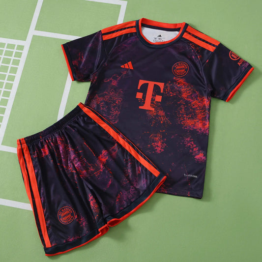 Kit Bambino Bayern Munich Third 26/27 Nero con dettagli Rosso Arancione