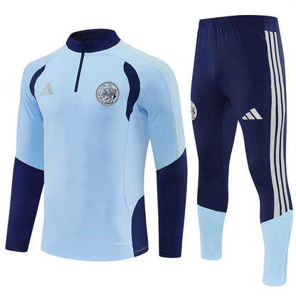 Tuta Ajax 26/27 Uomo Azzurro e Blu Navy | Tuta da Calcio - CalcioVivo