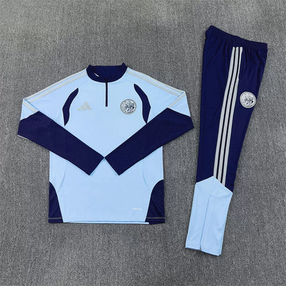 Tuta Ajax 26/27 Uomo Azzurro e Blu Navy | Tuta da Calcio - CalcioVivo