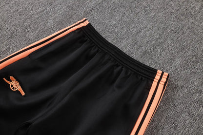 Tuta Full-zip Arsenal 26/27 Uomo Nero e Arancione | Tuta da Calcio - CalcioVivo
