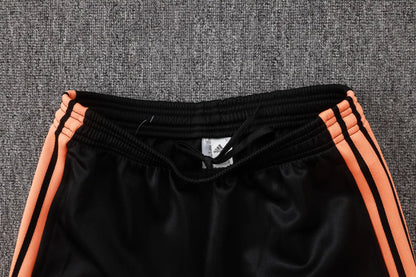 Tuta Full-zip Arsenal 26/27 Uomo Nero e Arancione | Tuta da Calcio - CalcioVivo