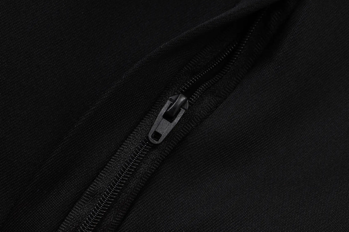 Tuta Full-zip Arsenal 26/27 Uomo Nero e Arancione | Tuta da Calcio - CalcioVivo
