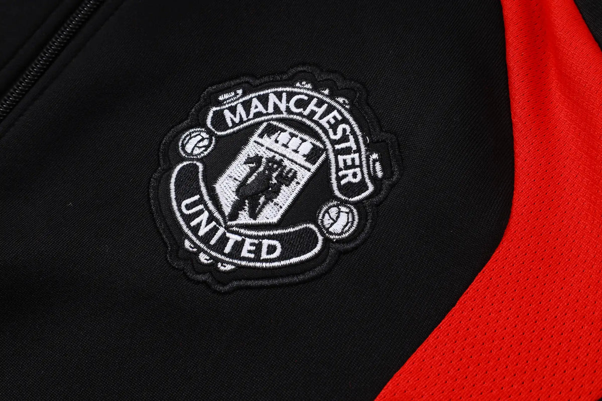 Tuta Full-zip Manchester United 26/27 Uomo Nero/Rosso | Tuta da Calcio - CalcioVivo