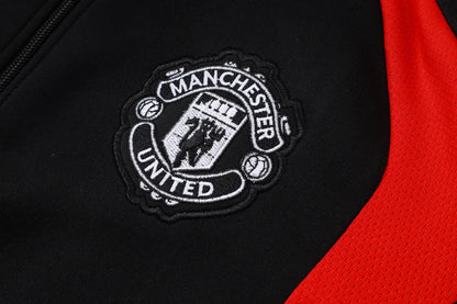 Tuta Full-zip Manchester United 26/27 Uomo Nero/Rosso | Tuta da Calcio - CalcioVivo