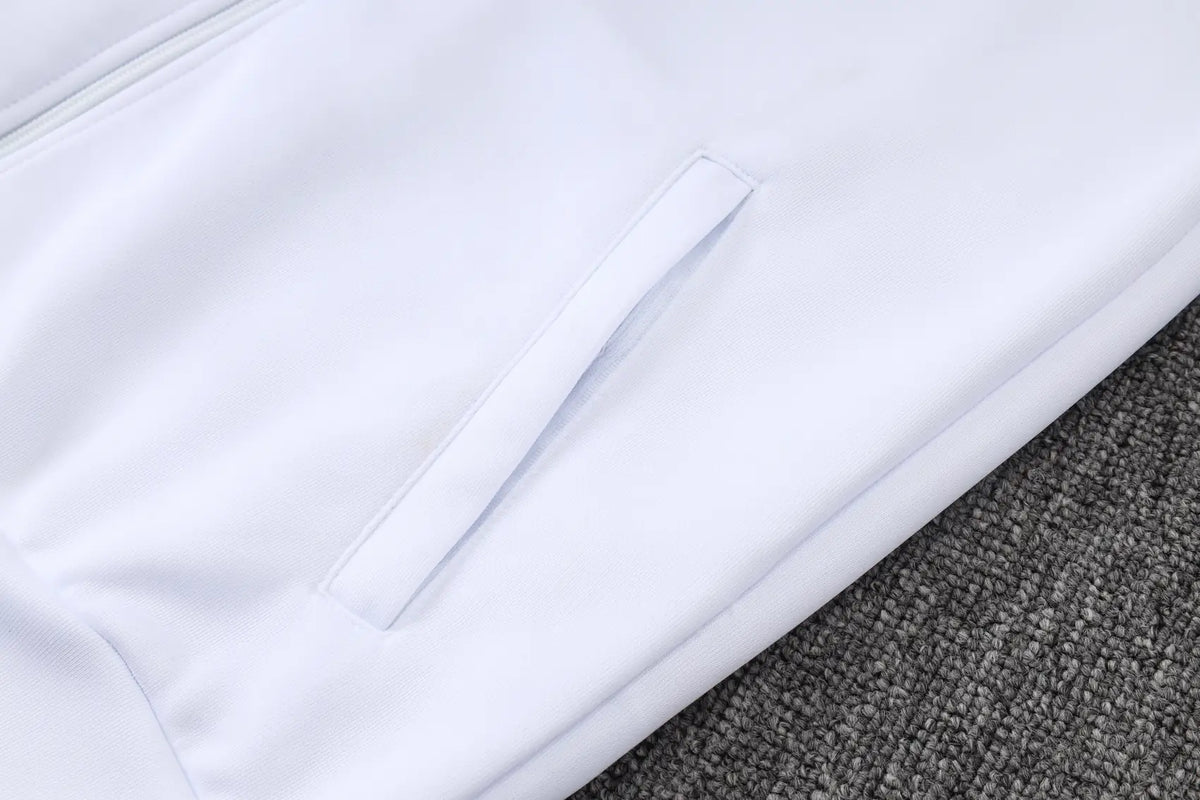 Tuta Full-zip Real Madrid 26/27 Uomo Bianco e Blu Navy | Tuta da Calcio - CalcioVivo