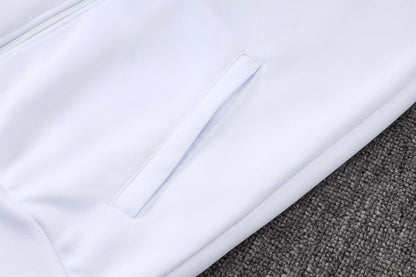 Tuta Full-zip Real Madrid 26/27 Uomo Bianco e Blu Navy | Tuta da Calcio - CalcioVivo