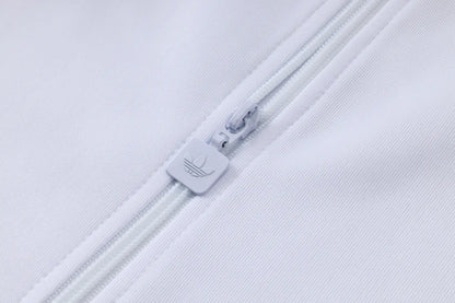 Tuta Full-zip Real Madrid 26/27 Uomo Bianco e Blu Navy | Tuta da Calcio - CalcioVivo