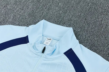Tuta Half-zip Manchester City 26/27 Uomo Azzurro e Blu Navy | Tuta da Calcio