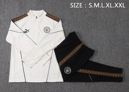 Tuta Half-zip Manchester City 26/27 Uomo Bianco e Nero | Tuta da Calcio - CalcioVivo