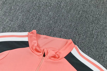 Tuta Half-zip Real Madrid 26/27 Uomo Rosa Corallo | Tuta da Calcio - CalcioVivo