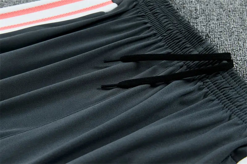 Tuta Half-zip Real Madrid 26/27 Uomo Rosa Corallo | Tuta da Calcio - CalcioVivo