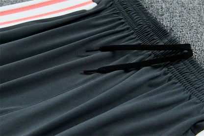 Tuta Half-zip Real Madrid 26/27 Uomo Rosa Corallo | Tuta da Calcio - CalcioVivo