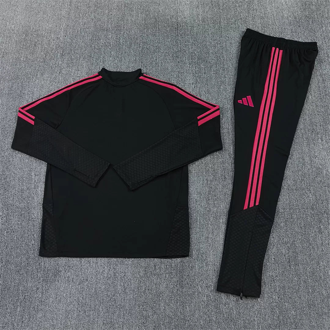 Tuta Real Madrid 26/27 Uomo Nero con dettagli Rosa | Tuta da Calcio - CalcioVivo