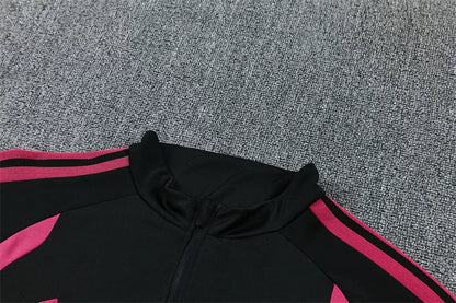 Tuta Real Madrid 26/27 Uomo Nero con dettagli Rosa | Tuta da Calcio - CalcioVivo